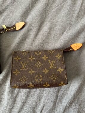 Louis Vuitton Monogram Canvas Wristlet in Brown and Tan (Small)